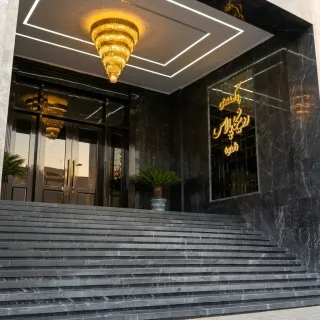 Main entrance of Ronika Palace with marble steps