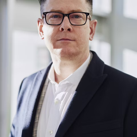 Portrait of David T., Managing Director of Marlin Group